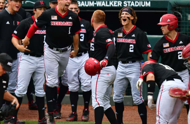 The Huskers celebrate Luke Roskam's solo home run baseball vs Arkansas 2021 G3